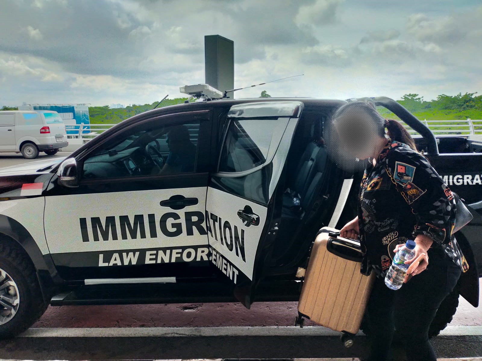 Deportasi NV (WN Singapura)